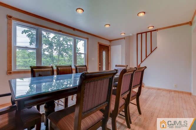139 Milltown Road East Brunswick, NJ 08816 - Photo 3 of 15 a view of a dining room with furniture window and outside view