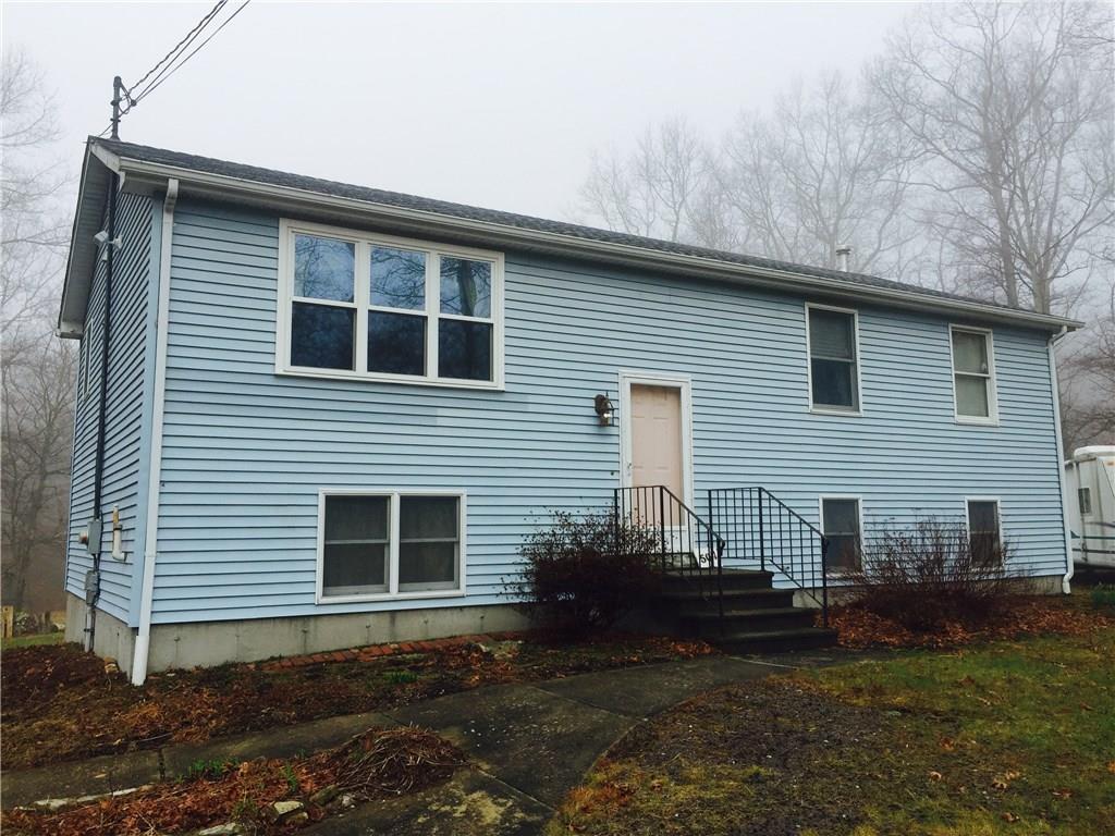 507 Valley View Road Sterling, CT 06377 - Photo 1 of 1 a front view of a house with a yard