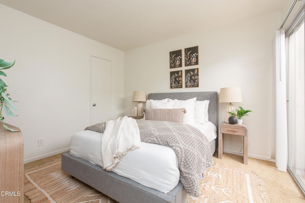 17516 Via Calma, Unit 39 Tustin, CA 92780 - Photo 19 of 29 a large white bed in a white room