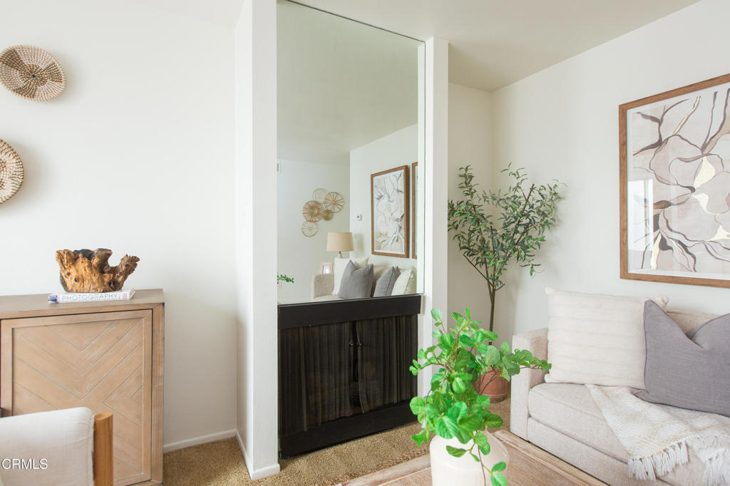 17516 Via Calma, Unit 39 Tustin, CA 92780 - Photo 5 of 29 a front view of a house with a potted plant