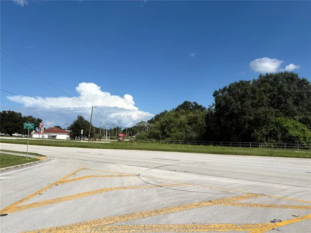 a view of a golf course with a lake