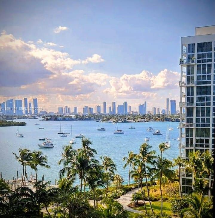 1500 Bay Road, Unit 854S Miami Beach, FL 33139 - Photo 12 of 20 a view of a lake with a building in front of it
