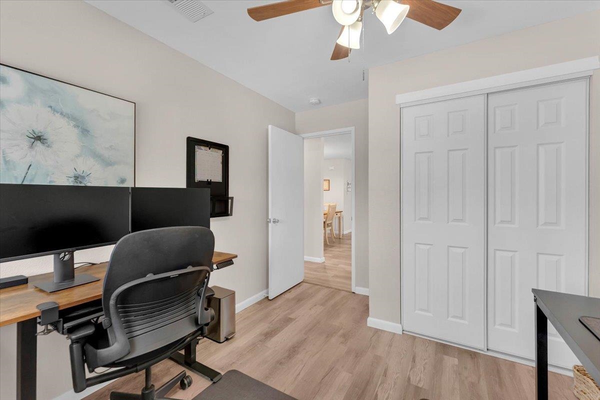 2110 Gentry Way Red Bluff, CA 96080 - Photo 26 of 47 a workspace with furniture and wooden floor