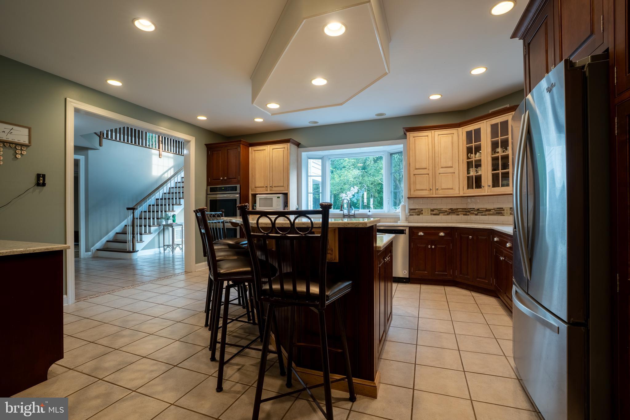 1627 East Saw Mill Road Quakertown, PA 18951 - Photo 20 of 61 a kitchen with granite countertop a stove a sink and a refrigerator