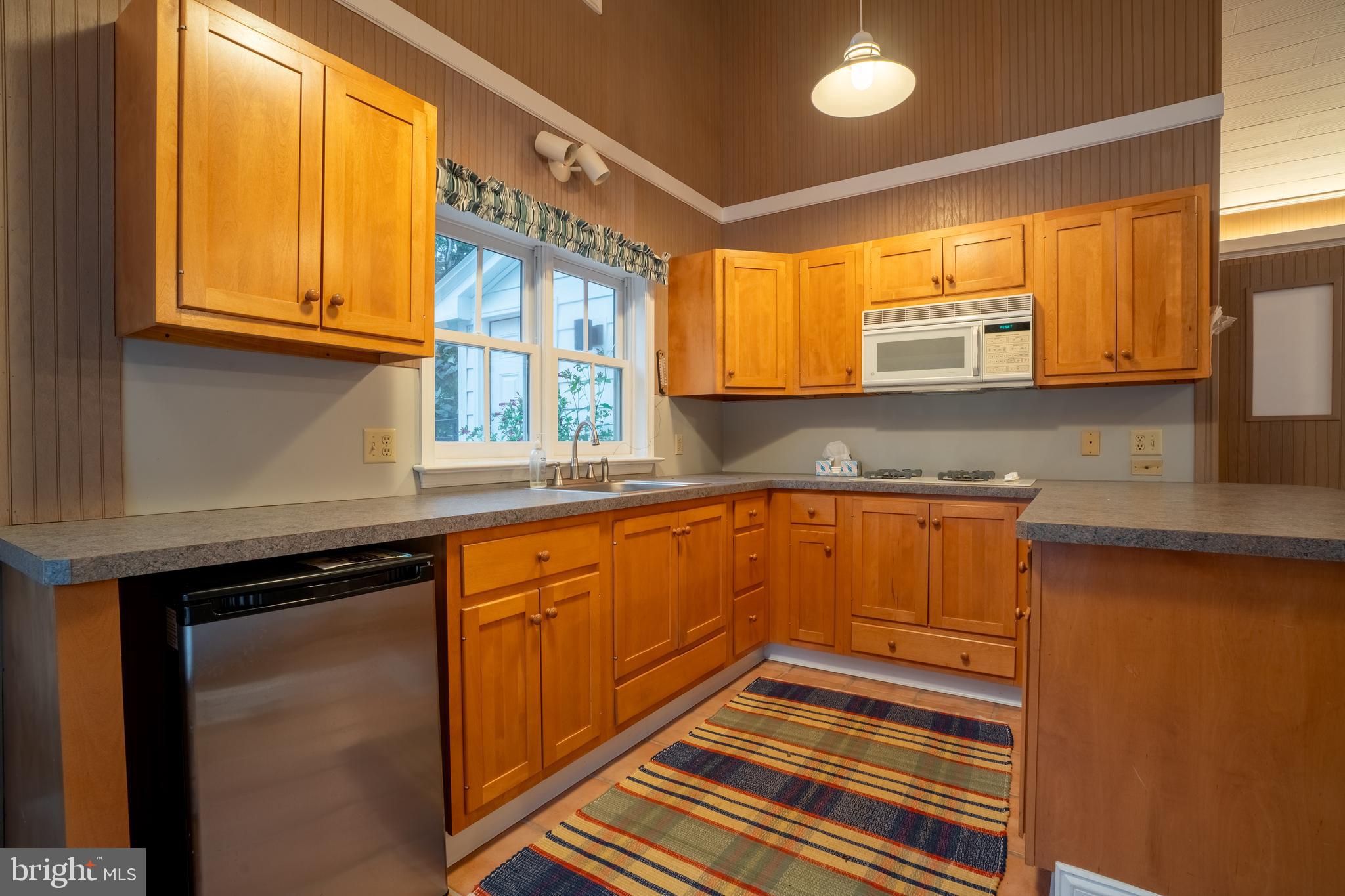 1627 East Saw Mill Road Quakertown, PA 18951 - Photo 60 of 61 a kitchen with stainless steel appliances granite countertop a sink and cabinets