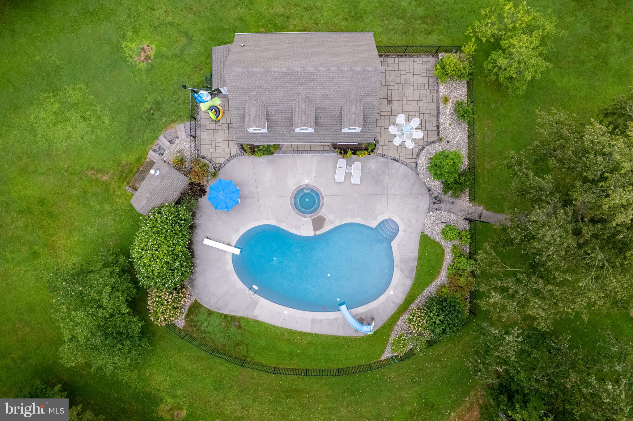 1627 East Saw Mill Road Quakertown, PA 18951 - Photo 6 of 61 an aerial view of a house with a swimming pool patio and outdoor seating