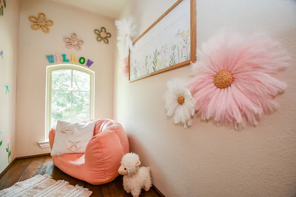 a bed room with a bed and a window