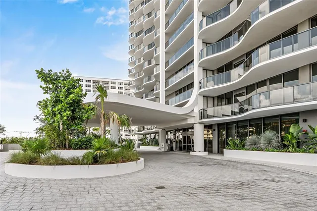 a view of balcony with wooden floor