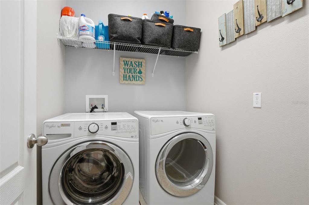 3933 Wind Dancer Circle St. Cloud, FL 34772 - Photo 28 of 35 a utility room with dryer and washer