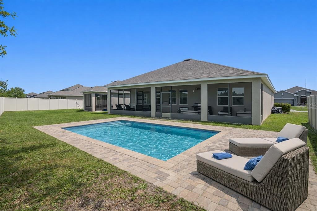 3933 Wind Dancer Circle St. Cloud, FL 34772 - Photo 35 of 35 a view of house that has a yard
