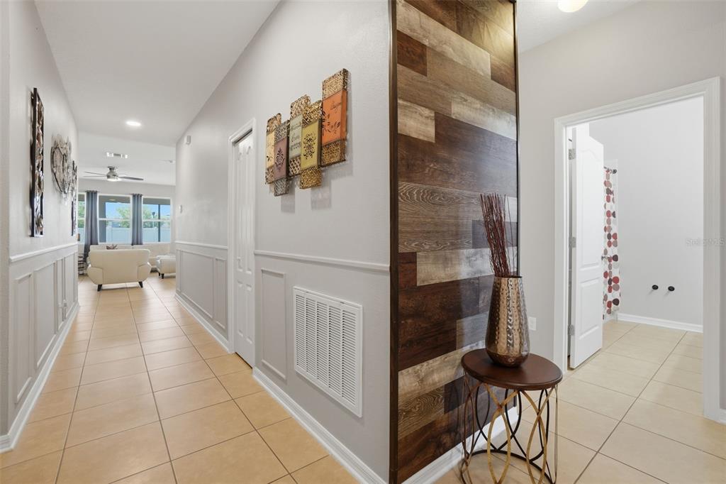 3933 Wind Dancer Circle St. Cloud, FL 34772 - Photo 5 of 35 a view of a hallway with a livingroom and furniture
