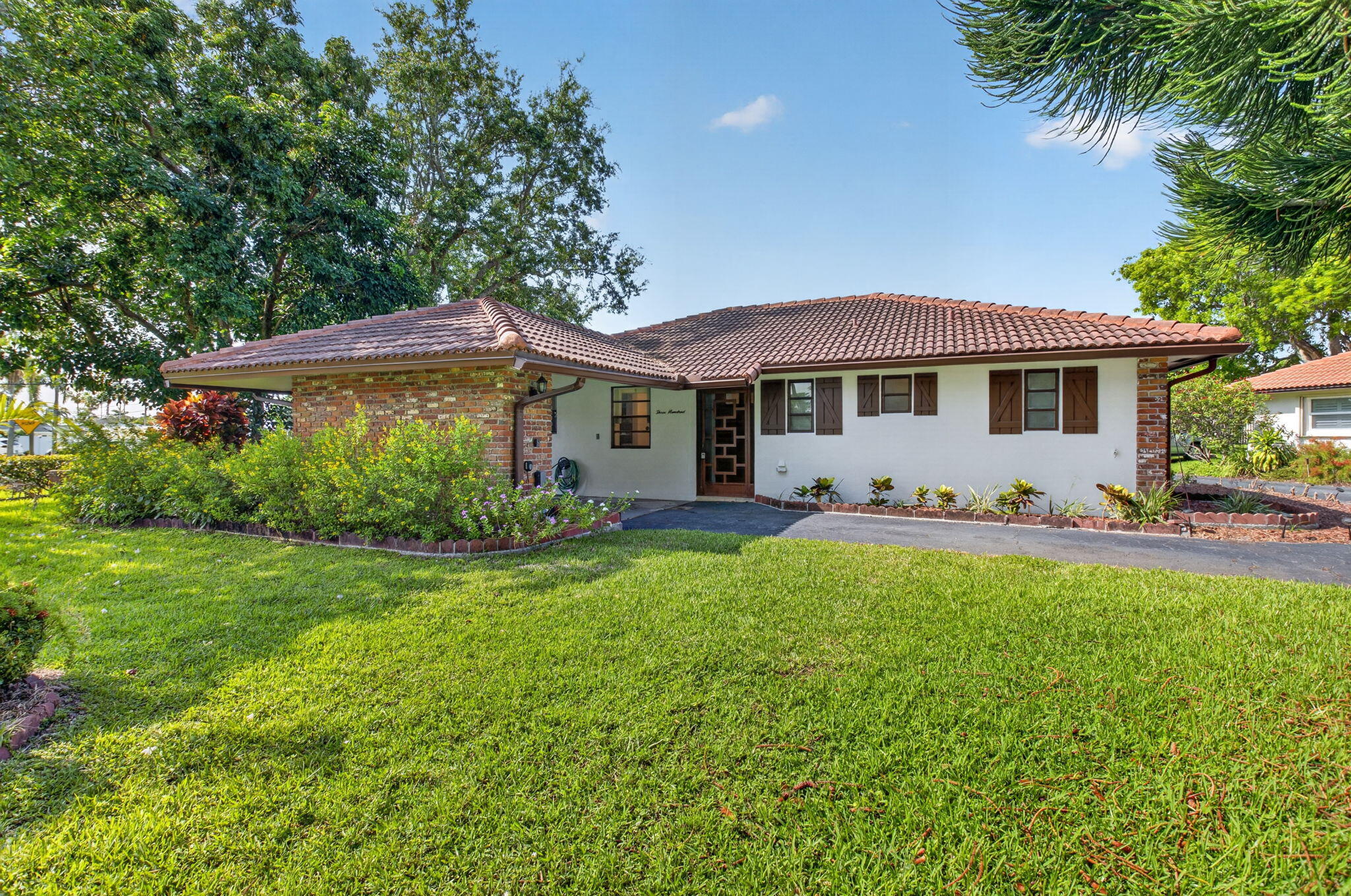 300 Northwest 42nd Street Boca Raton, FL 33431 - Photo 1 of 34 1-web-or-mls-DSC_5357