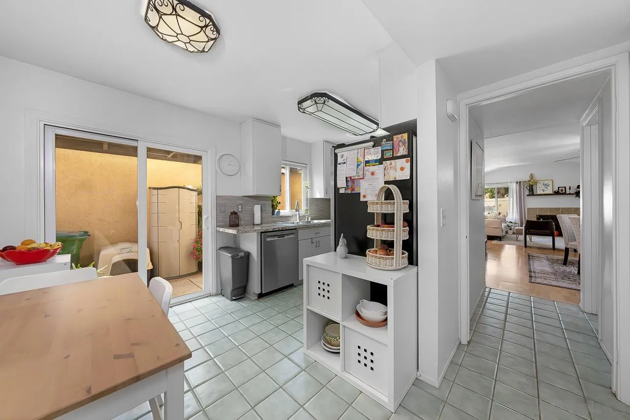 10366 Rochelle Avenue Santee, CA 92071 - Photo 11 of 28 a kitchen with a refrigerator and a sink