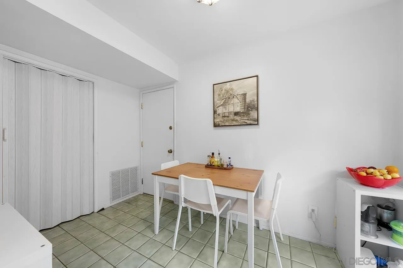10366 Rochelle Avenue Santee, CA 92071 - Photo 14 of 28 a dining room with furniture and wooden floor