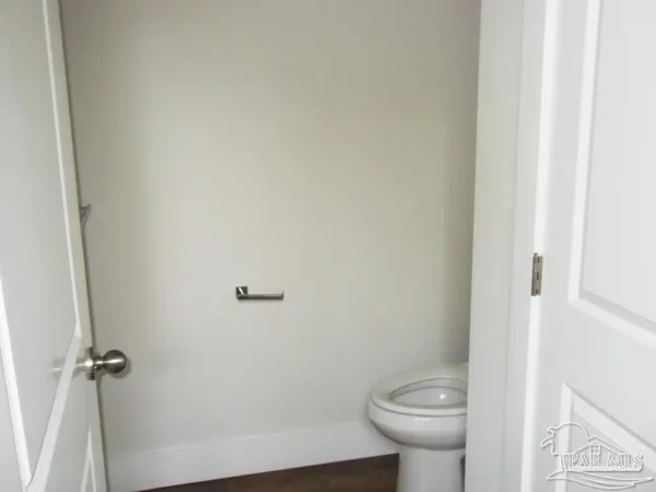a bathroom with a toilet and a sink