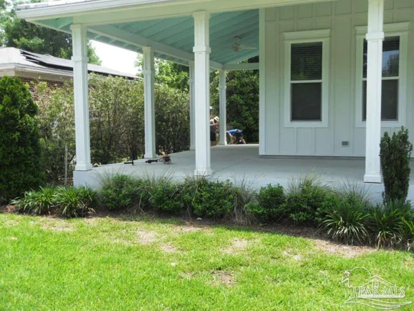 a view of a backyard with garden