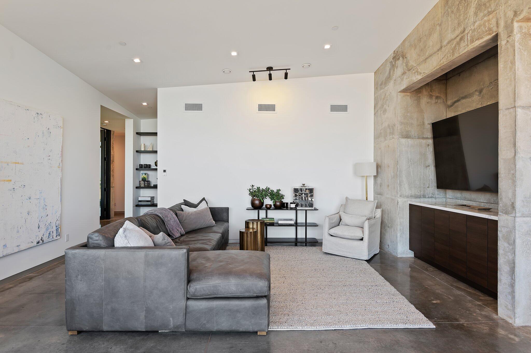 2805 Spyglass Ridge Road Santa Barbara, CA 93105 - Photo 27 of 67 a living room with furniture and a flat screen tv