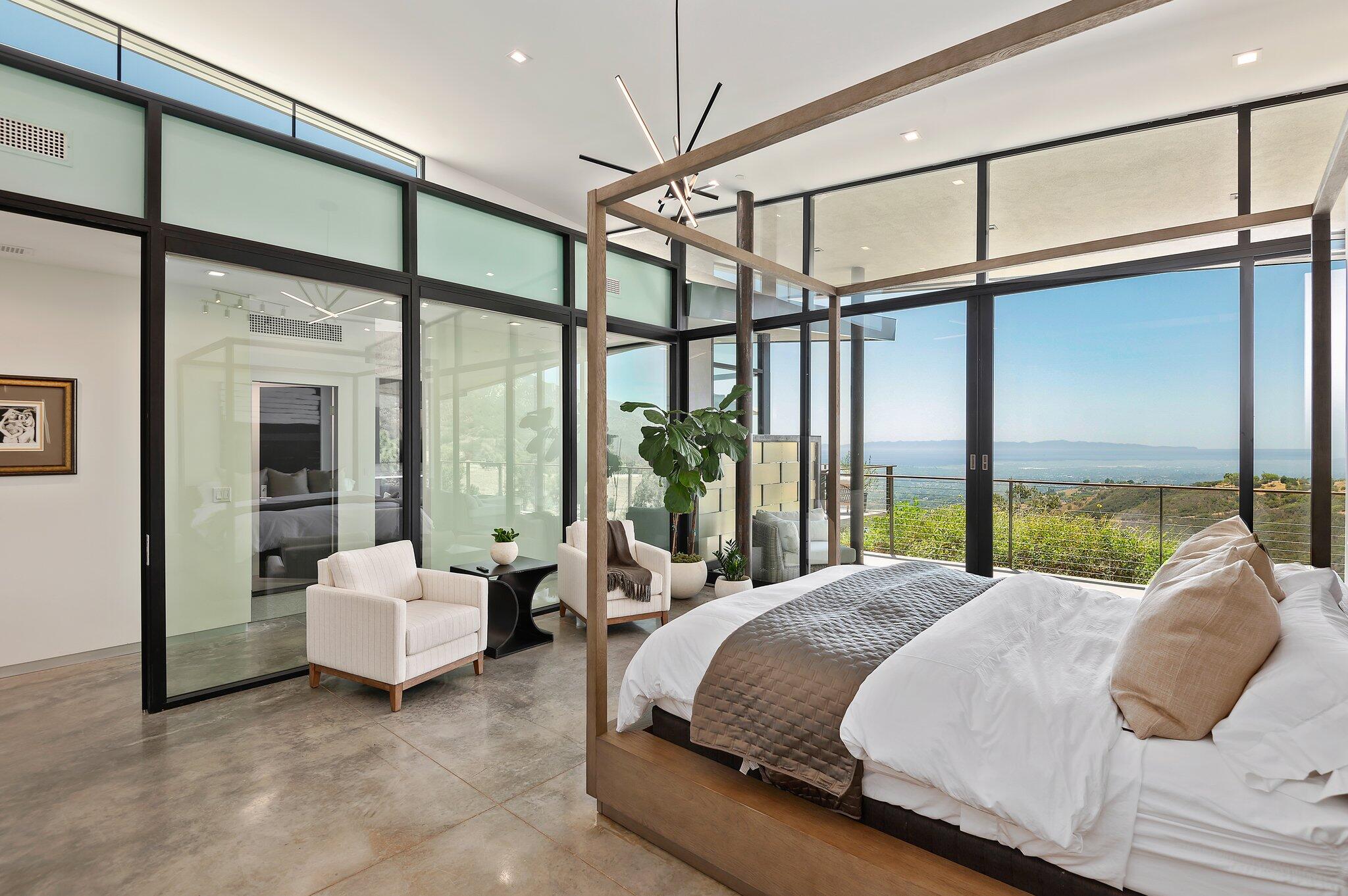 2805 Spyglass Ridge Road Santa Barbara, CA 93105 - Photo 36 of 67 a bedroom with a bed window and a balcony