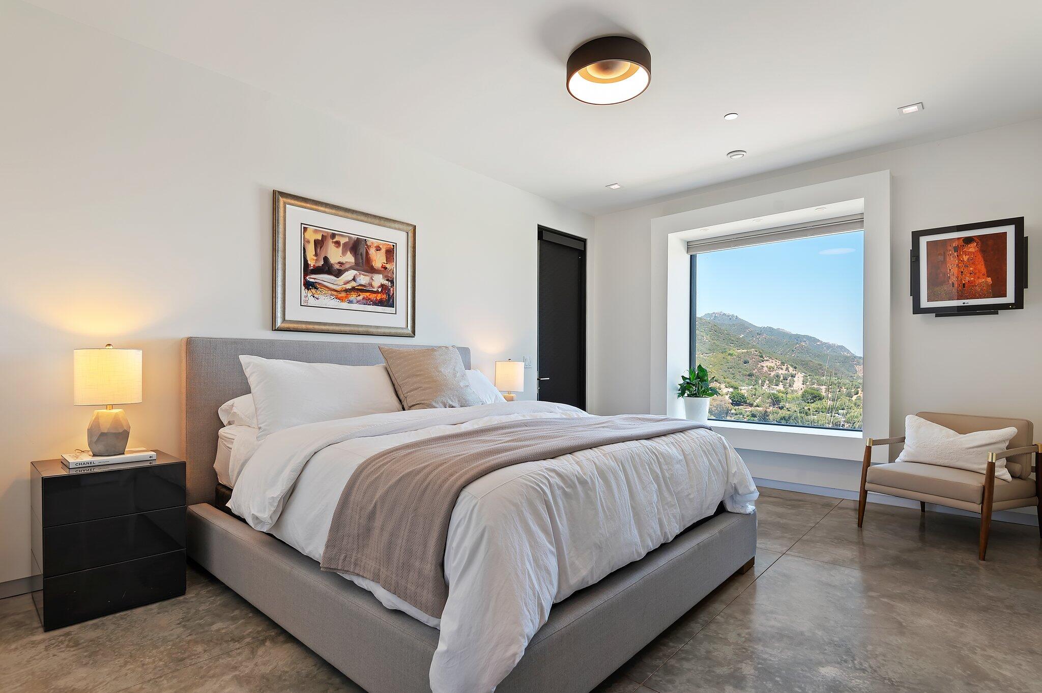 2805 Spyglass Ridge Road Santa Barbara, CA 93105 - Photo 41 of 67 a bedroom with a bed and a large window