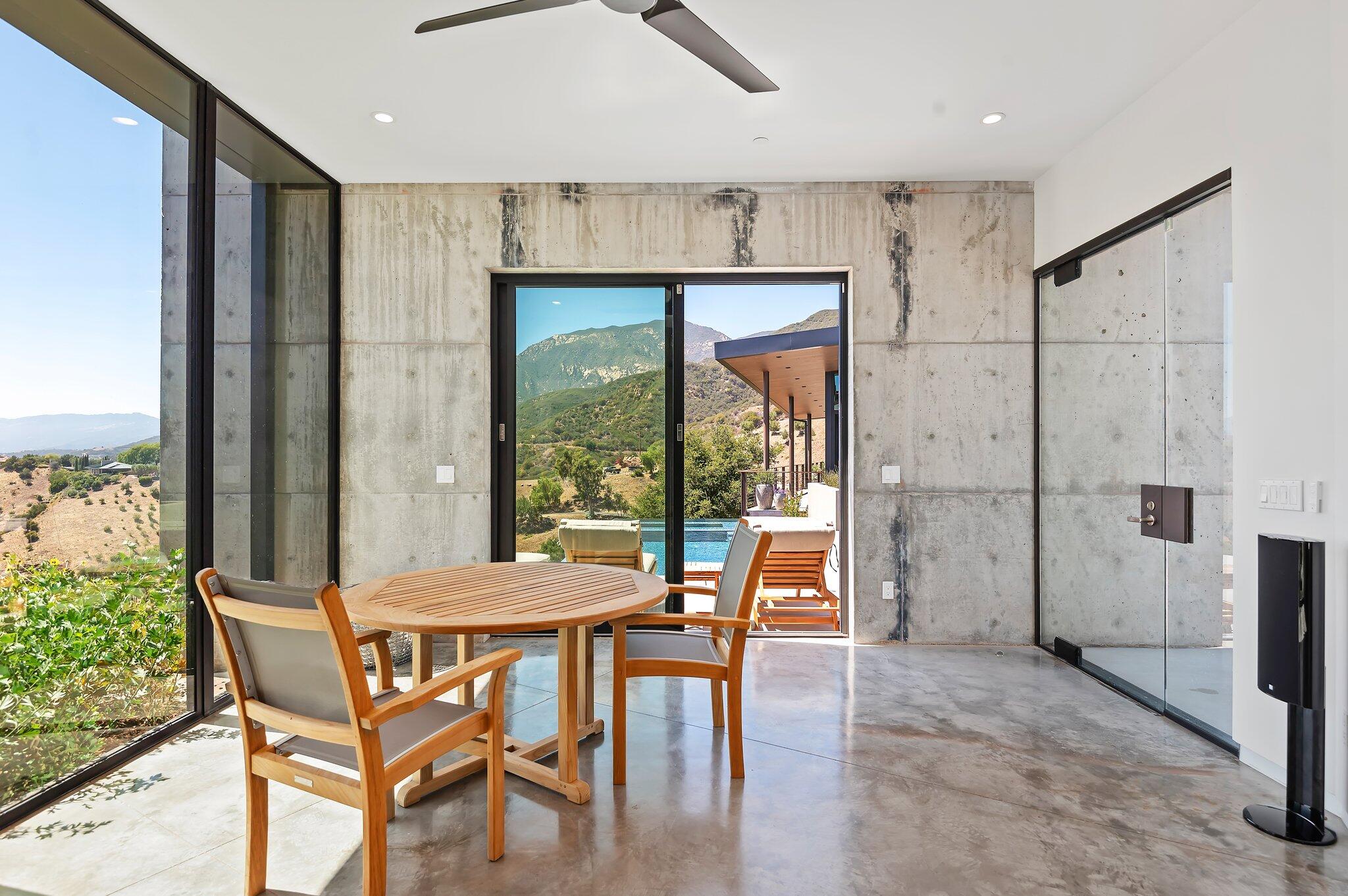 2805 Spyglass Ridge Road Santa Barbara, CA 93105 - Photo 50 of 67 a view of a dining room with furniture and a window