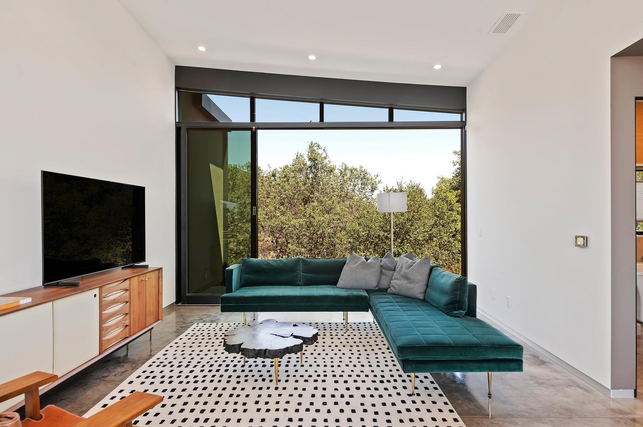 2805 Spyglass Ridge Road Santa Barbara, CA 93105 - Photo 54 of 67 a living room with furniture and a flat screen tv