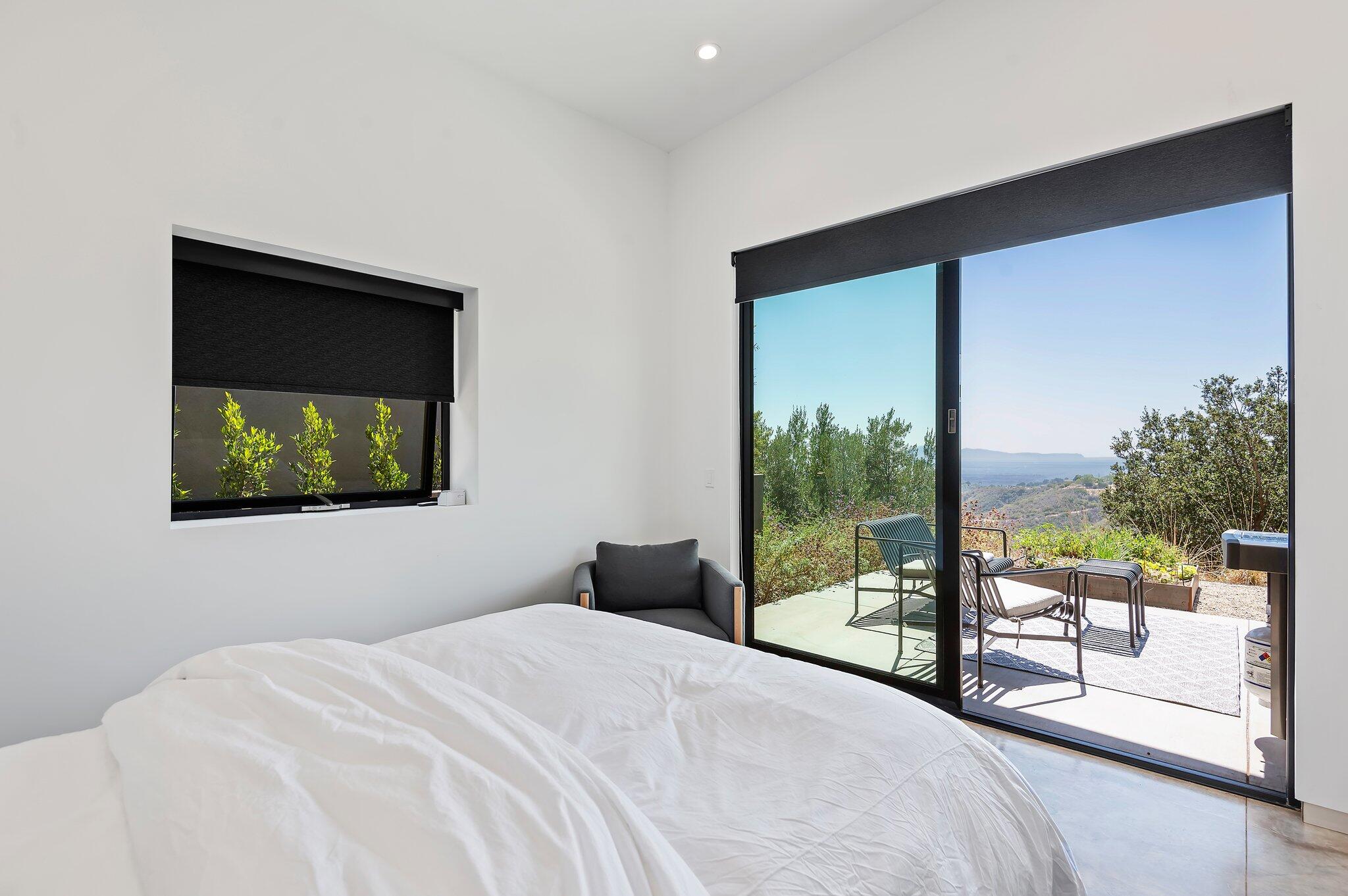 2805 Spyglass Ridge Road Santa Barbara, CA 93105 - Photo 56 of 67 a bedroom with a bed and a window