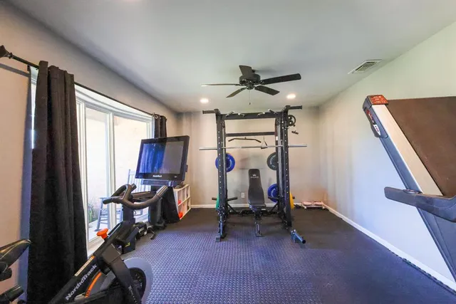a view of a room with gym equipment