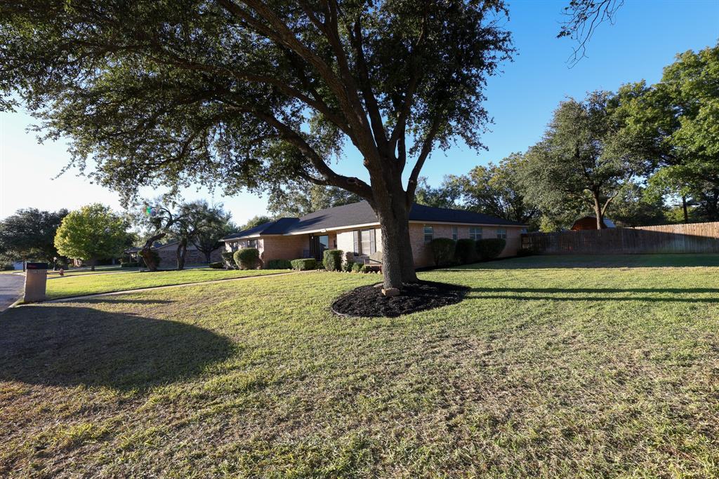 1300 Hillcrest Road Coleman, TX 76834 - Photo 29 of 35 a view of a house with a yard