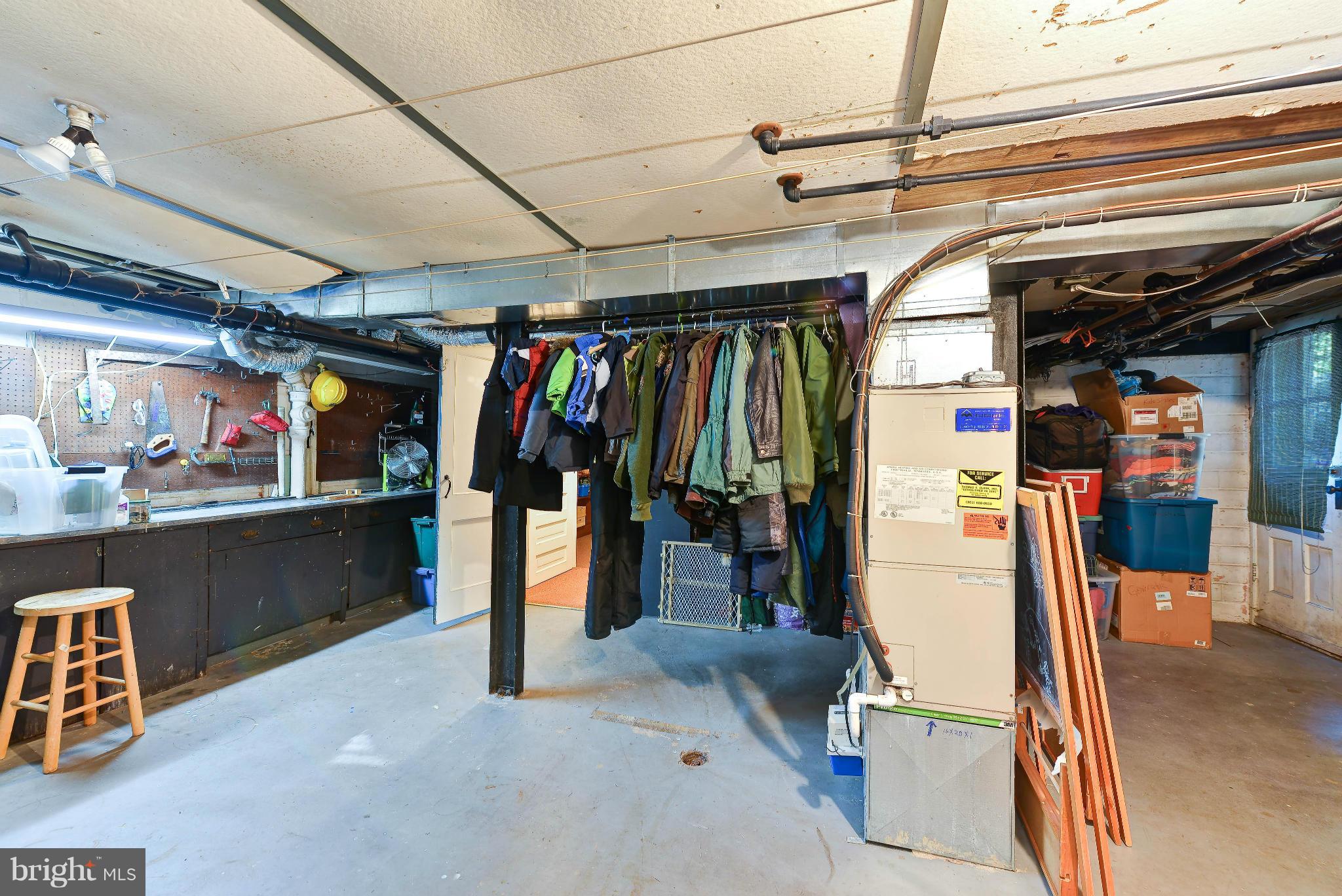 1917 Rookwood Road Silver Spring, MD 20910 - Photo 22 of 30 Unfinished basement area, w/ work bench, laundry
