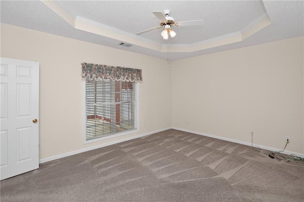 181 Windsor Circle Stockbridge, GA 30281 - Photo 12 of 49 a view of an empty room with a window