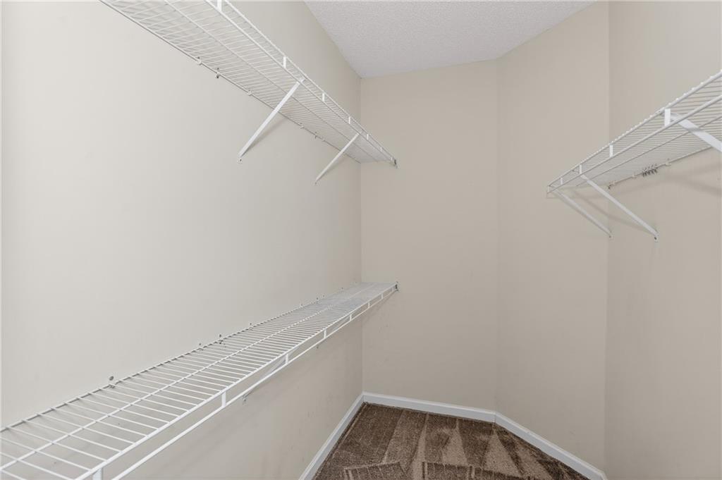 181 Windsor Circle Stockbridge, GA 30281 - Photo 13 of 49 a view of a room with racks on the wall