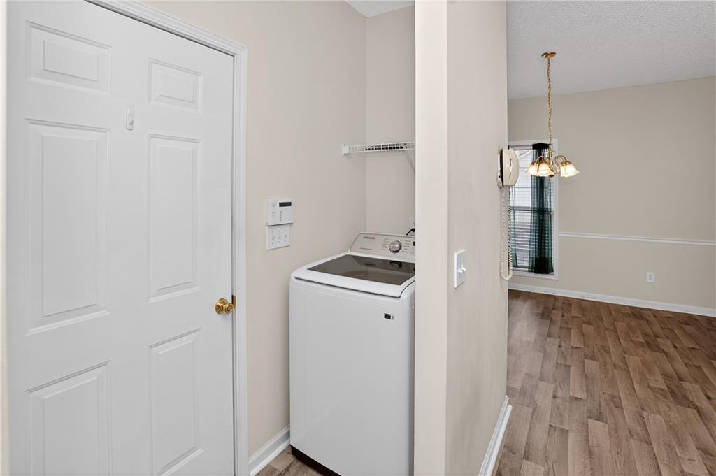 181 Windsor Circle Stockbridge, GA 30281 - Photo 23 of 49 a bathroom with a sink and mirror