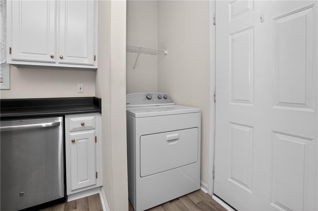181 Windsor Circle Stockbridge, GA 30281 - Photo 24 of 49 a view of cabinets and wooden floor