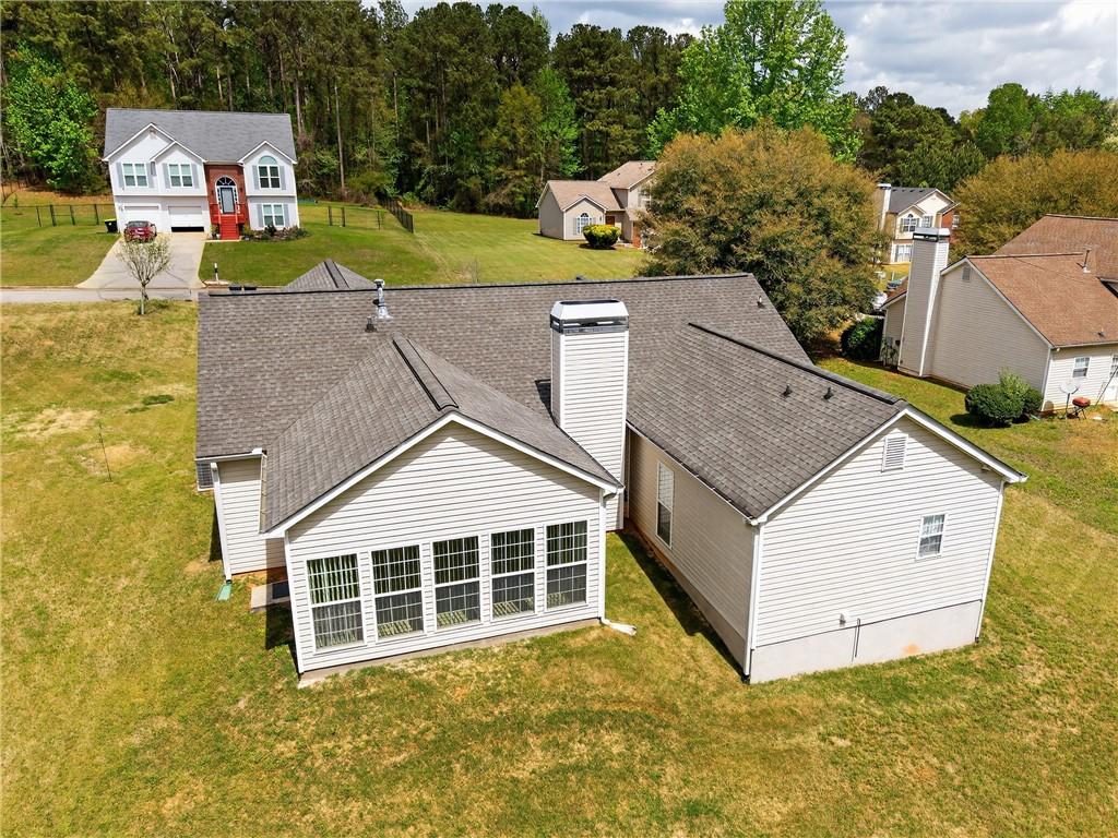 181 Windsor Circle Stockbridge, GA 30281 - Photo 43 of 49 an aerial view of a house with swimming pool and large trees