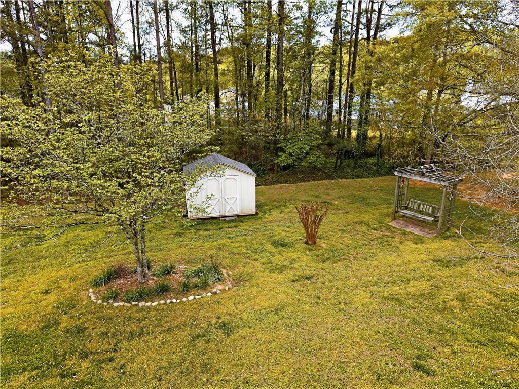 181 Windsor Circle Stockbridge, GA 30281 - Photo 44 of 49 a view of a garden with an outdoor space