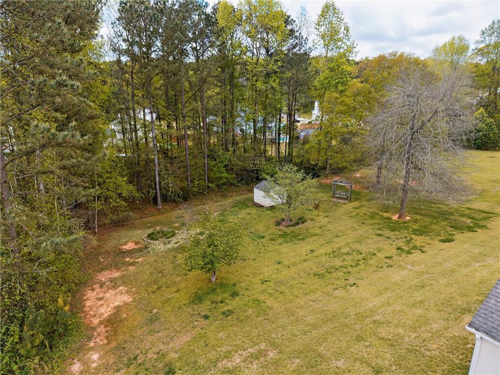 181 Windsor Circle Stockbridge, GA 30281 - Photo 45 of 49 a view of a yard with trees