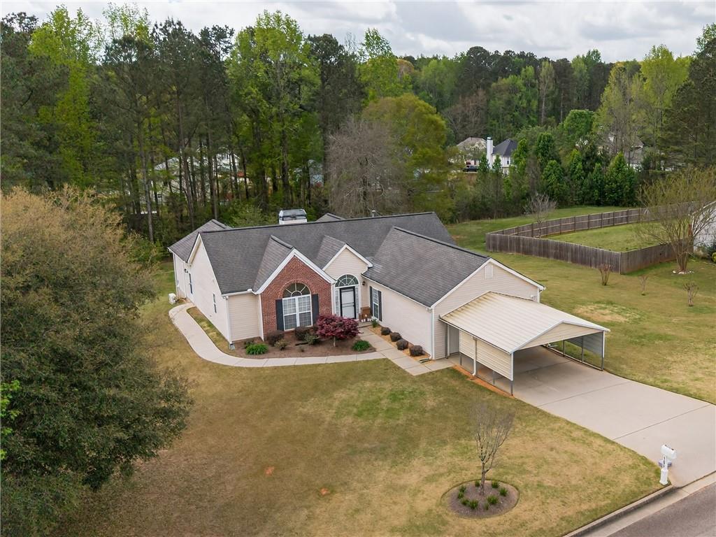 181 Windsor Circle Stockbridge, GA 30281 - Photo 49 of 49 an aerial view of a house with swimming pool and green space
