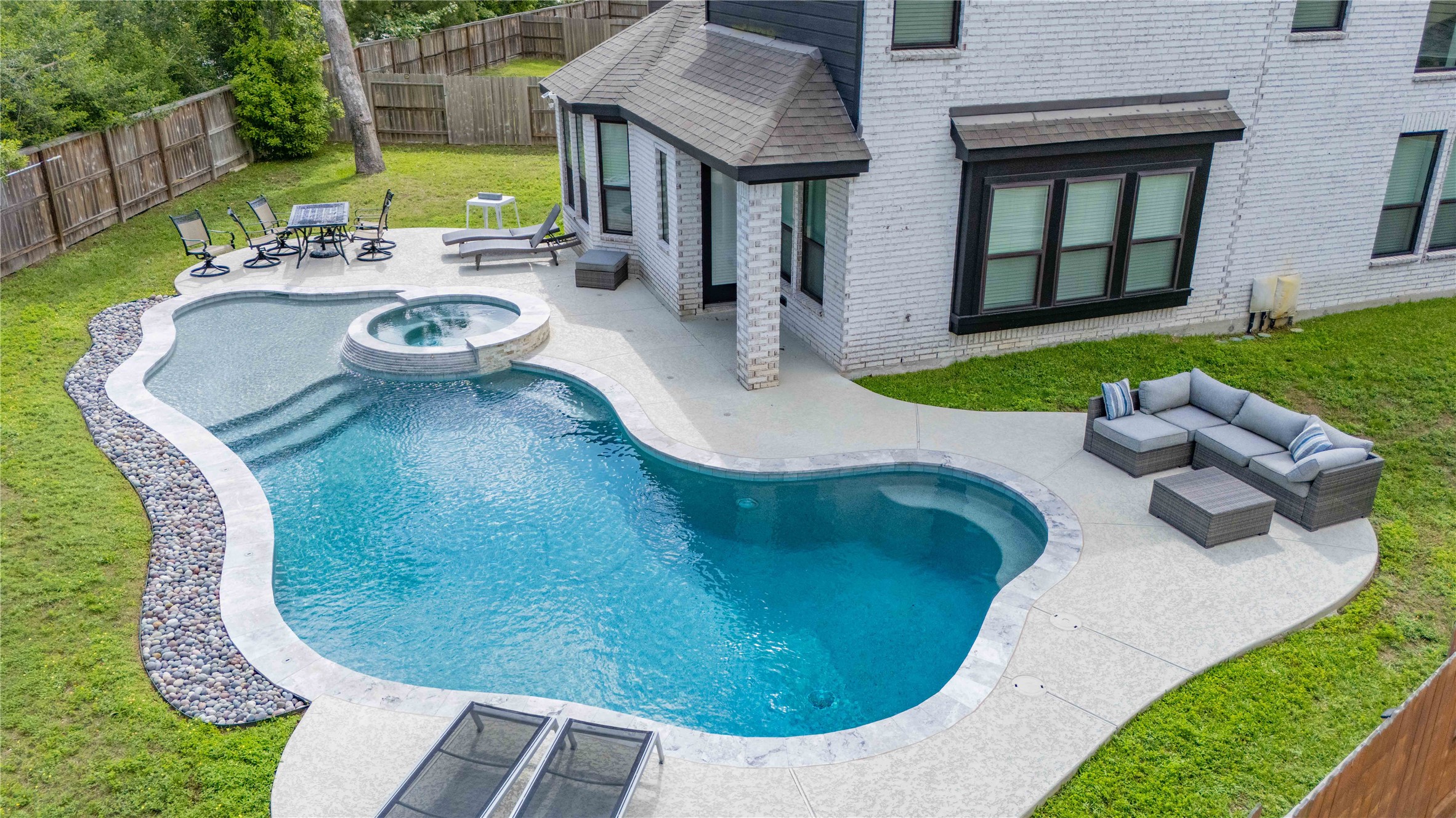527 Chestnut Reef Court Conroe, TX 77304 - Photo 1 of 40 a view of a patio with furniture