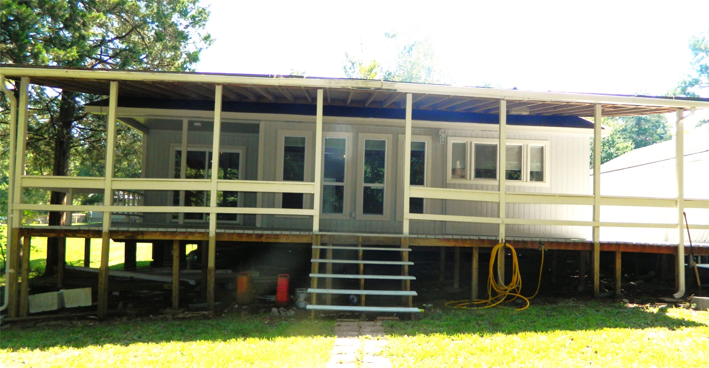 90 Cove Road Coldspring, TX 77331 - Photo 11 of 24 a front view of a house with a yard