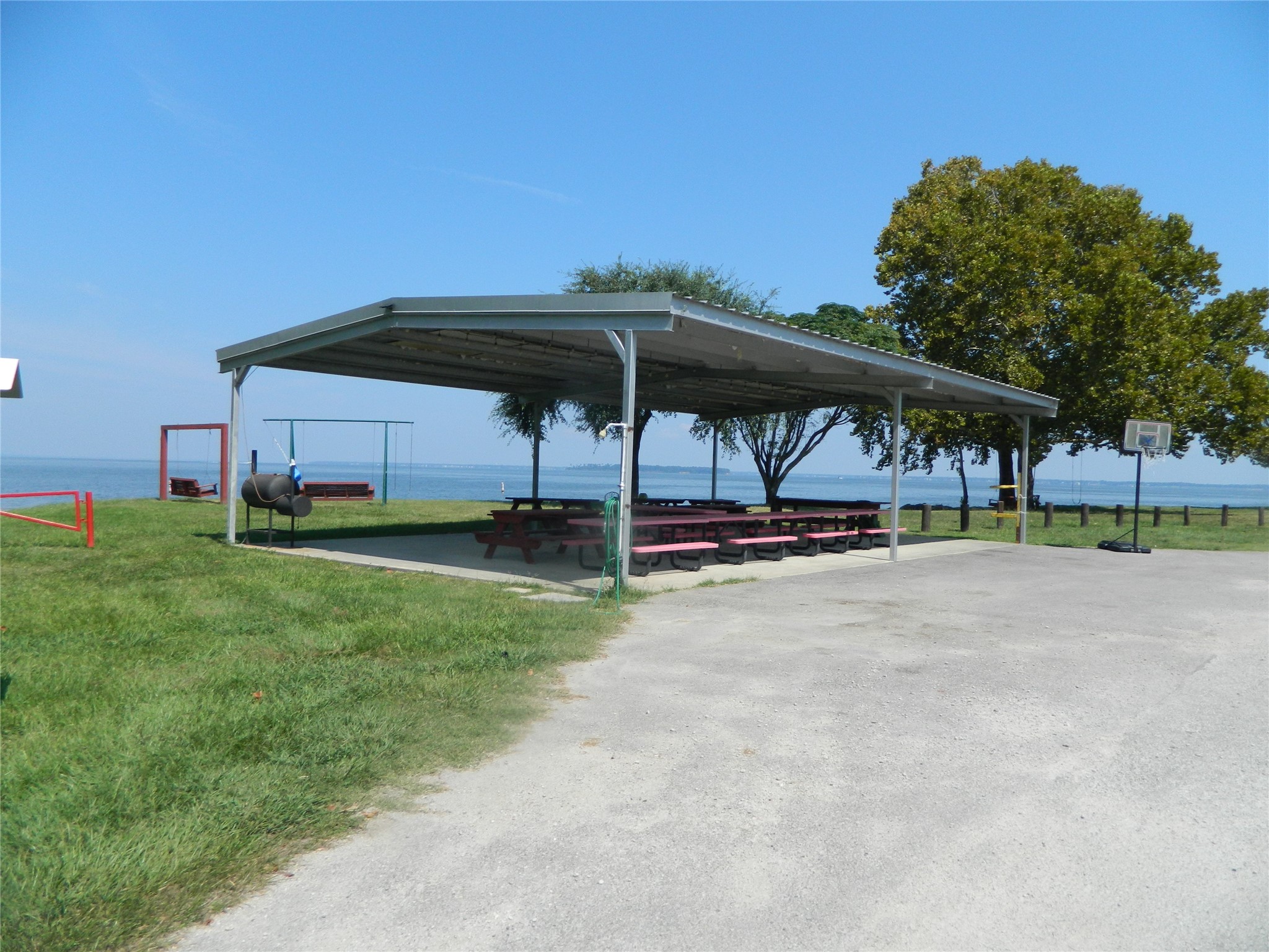 90 Cove Road Coldspring, TX 77331 - Photo 4 of 24 a view of a wooden deck with a yard
