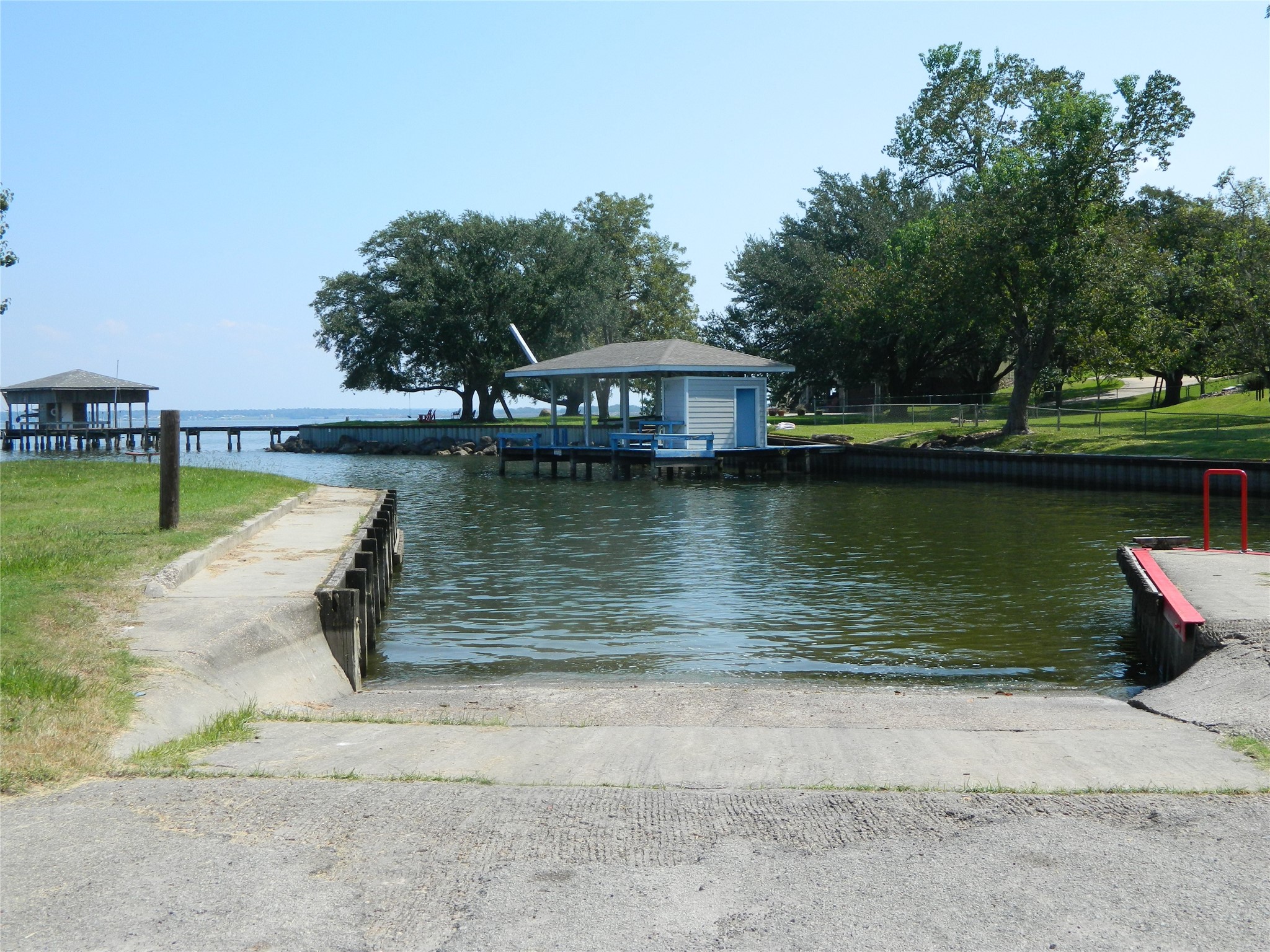 90 Cove Road Coldspring, TX 77331 - Photo 6 of 24 a view of a lake with houses
