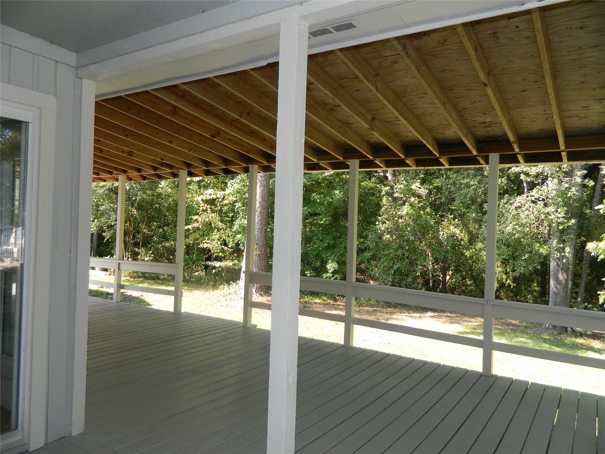 90 Cove Road Coldspring, TX 77331 - Photo 7 of 24 a view of porch with wooden floor
