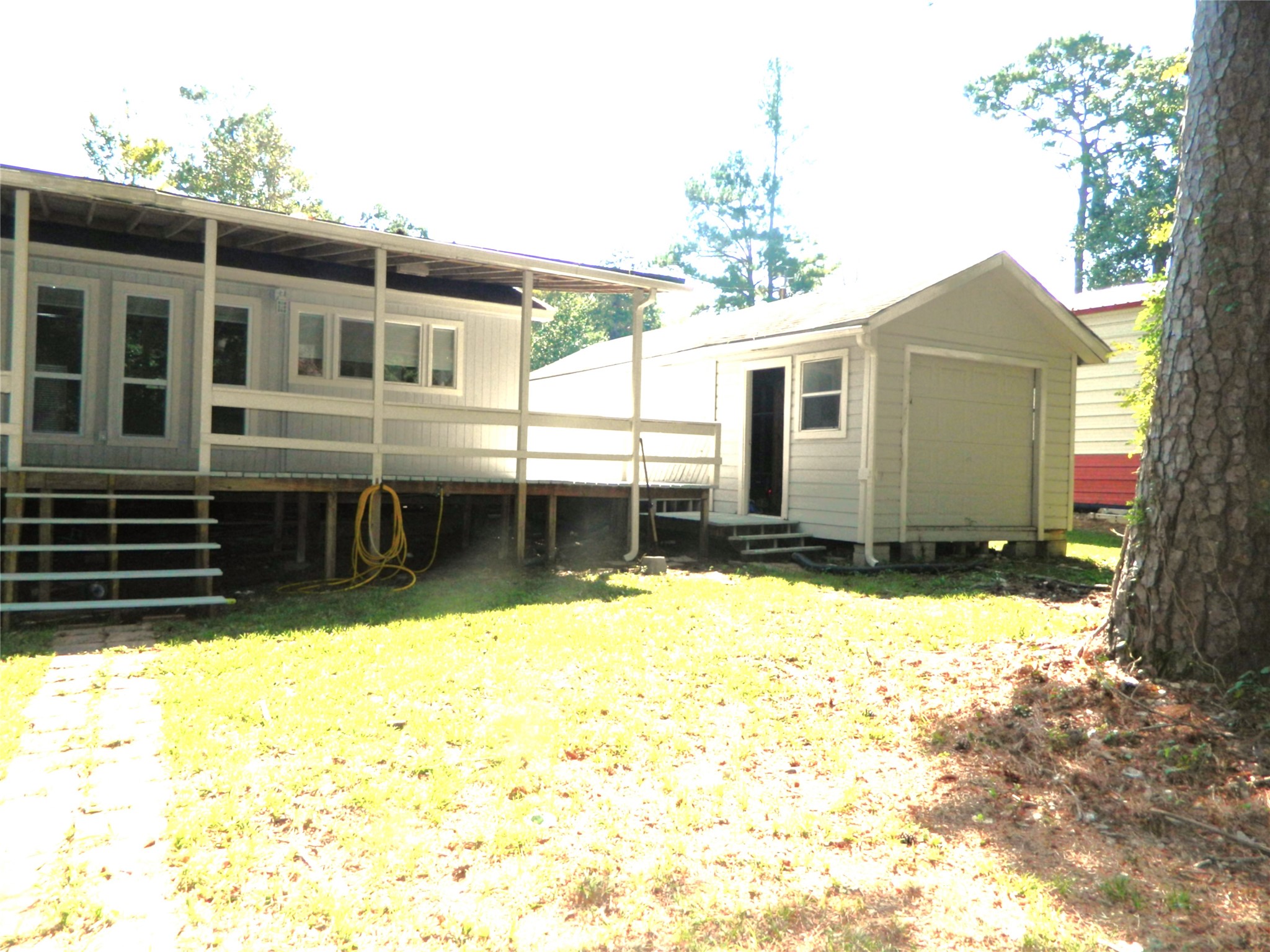 90 Cove Road Coldspring, TX 77331 - Photo 10 of 24 a view of a house with a yard
