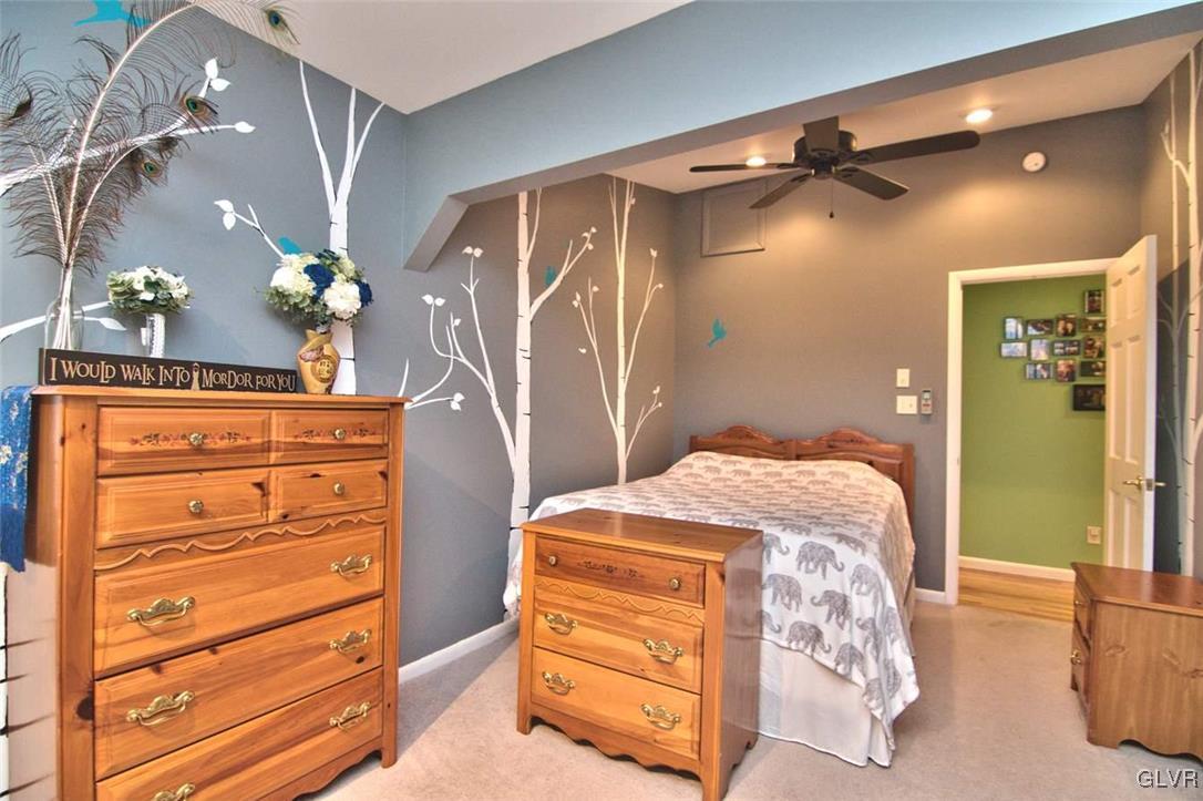 239 Dyson Road Swiftwater, PA 18370 - Photo 29 of 48 a bedroom with a bed and a dresser