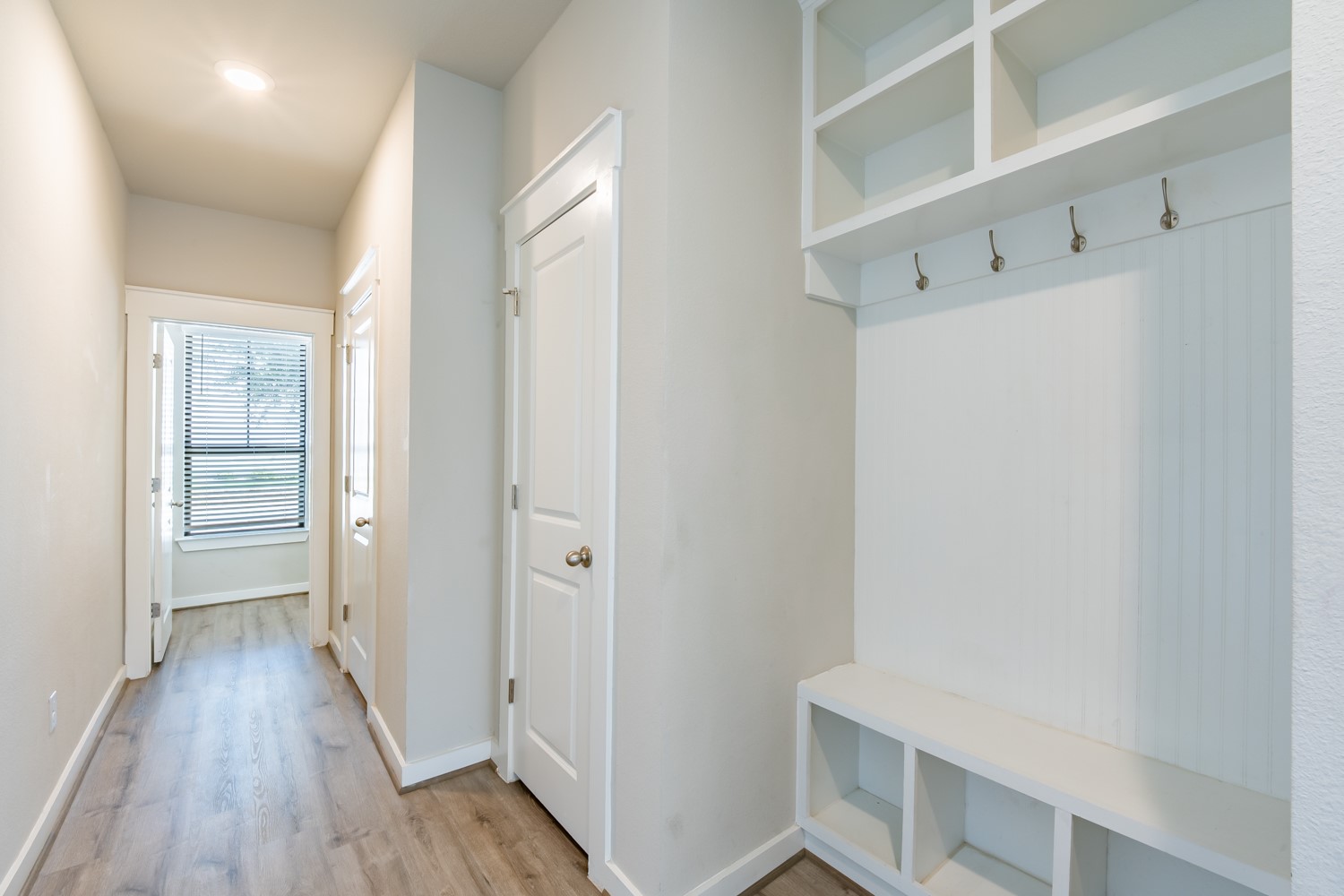 147 Waterside Road, Unit A Buda, TX 78610 - Photo 8 of 27 A welcoming entryway with built-in storage solutions and durable flooring.