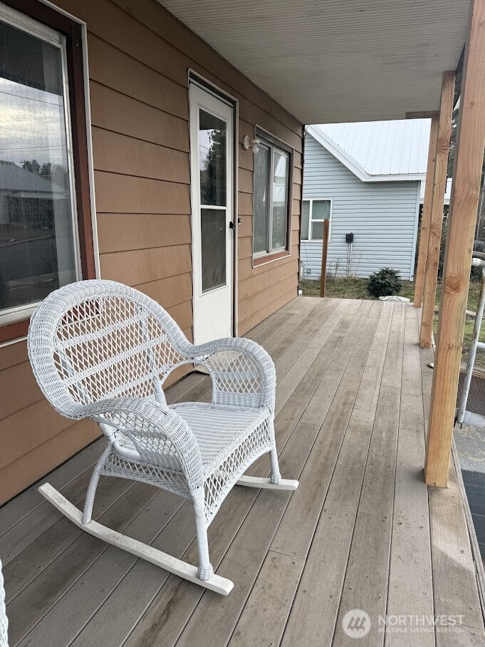 411 South Division Street Odessa, WA 99159 - Photo 15 of 20 a view of a bedroom with wooden floor and fence