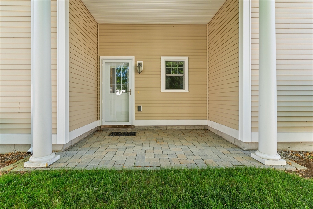 4 Emerald Way, Unit 4 Salisbury, MA 01952 - Photo 20 of 40 a view of a backyard with wooden floor