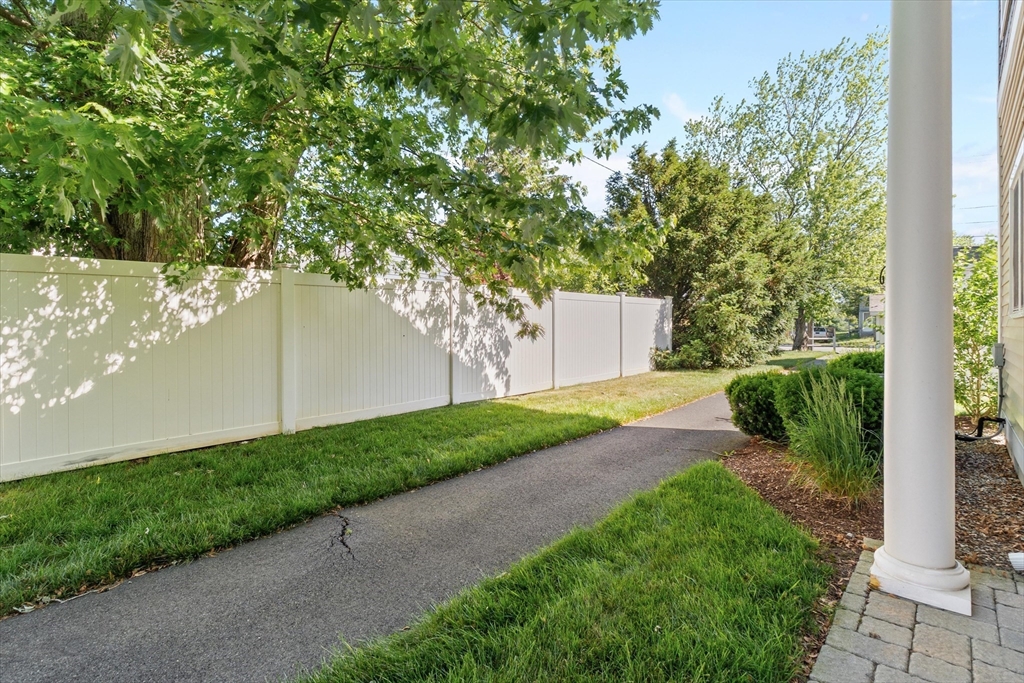 4 Emerald Way, Unit 4 Salisbury, MA 01952 - Photo 21 of 40 front view of a house with a yard