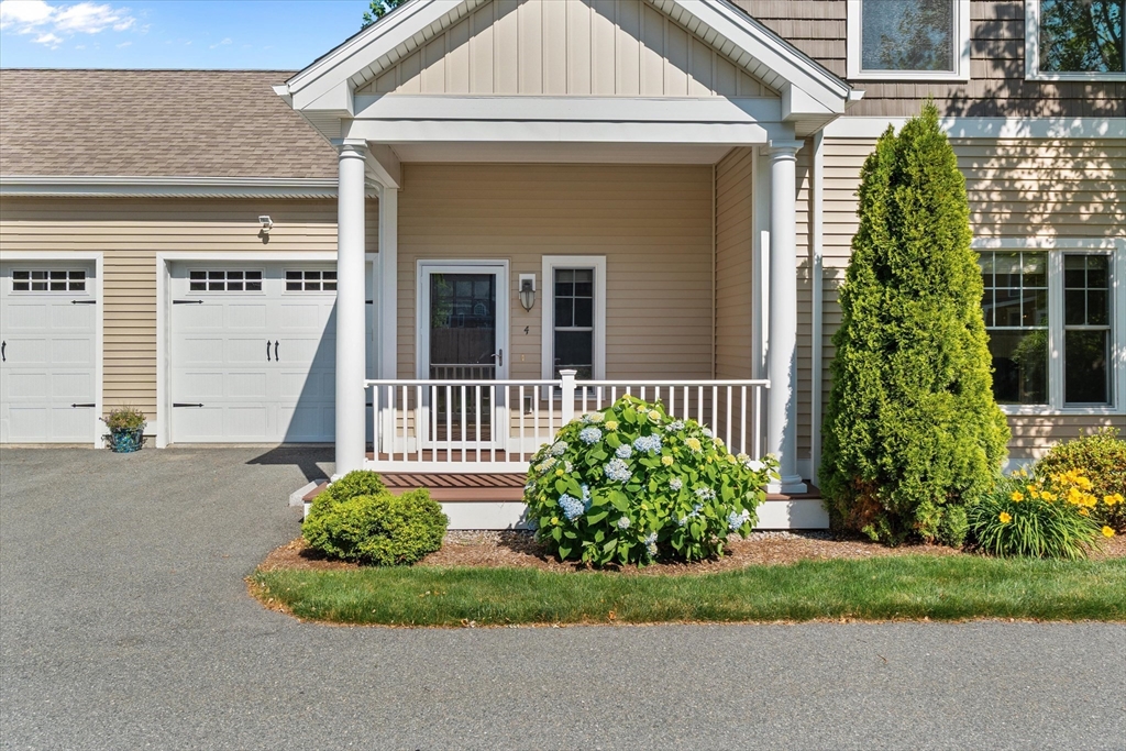 4 Emerald Way, Unit 4 Salisbury, MA 01952 - Photo 3 of 40 front view of a house with a yard