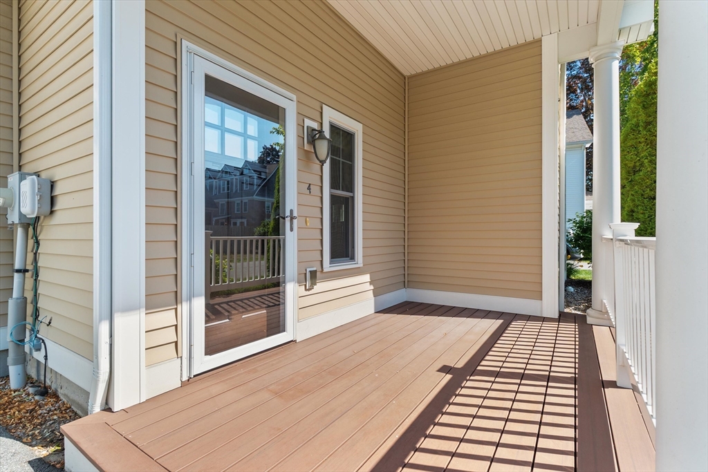 4 Emerald Way, Unit 4 Salisbury, MA 01952 - Photo 4 of 40 a balcony view with a glass door